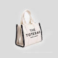 Black Letter Canvas Tote Bag on sale